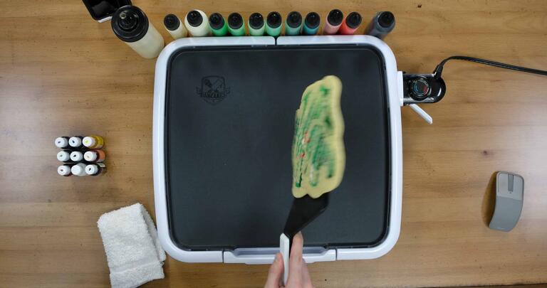 Bulbasaur pancake art step 9.2: ...turn it over smoothly...