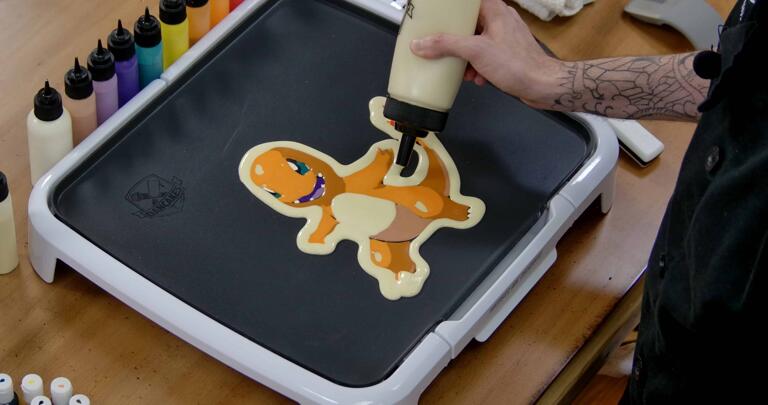 Charmander Pancake Art step 8.2: You'll want to fill all around the outside edge. It can be a very soothing process.